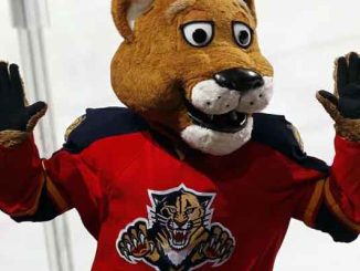 The Florida Panthers mascot with his hands in the air