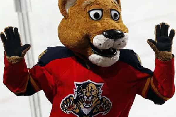 The Florida Panthers mascot with his hands in the air