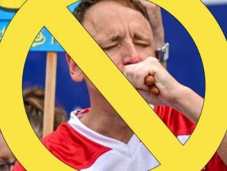 Joey Chestnut eating hot dogs with a no symbol placed over his face