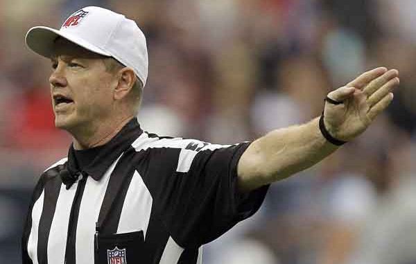 Super Bowl LIX ref Carl Cheffers signaling a first down