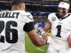 Jalen Hurts shaking hands with Saquon Barkley