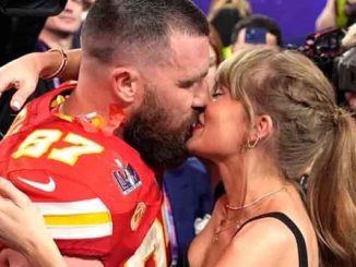 Taylor Swift and Travis Kelce kissing after the Super Bowl