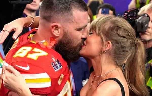 Taylor Swift and Travis Kelce kissing after the Super Bowl